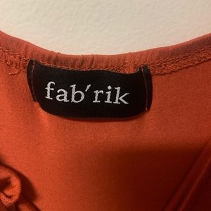 burnt orange jumpsuit